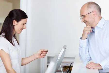 woman entering insurance info